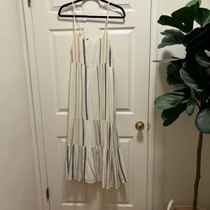 White striped midi dress, flowy and easy to throw on.
